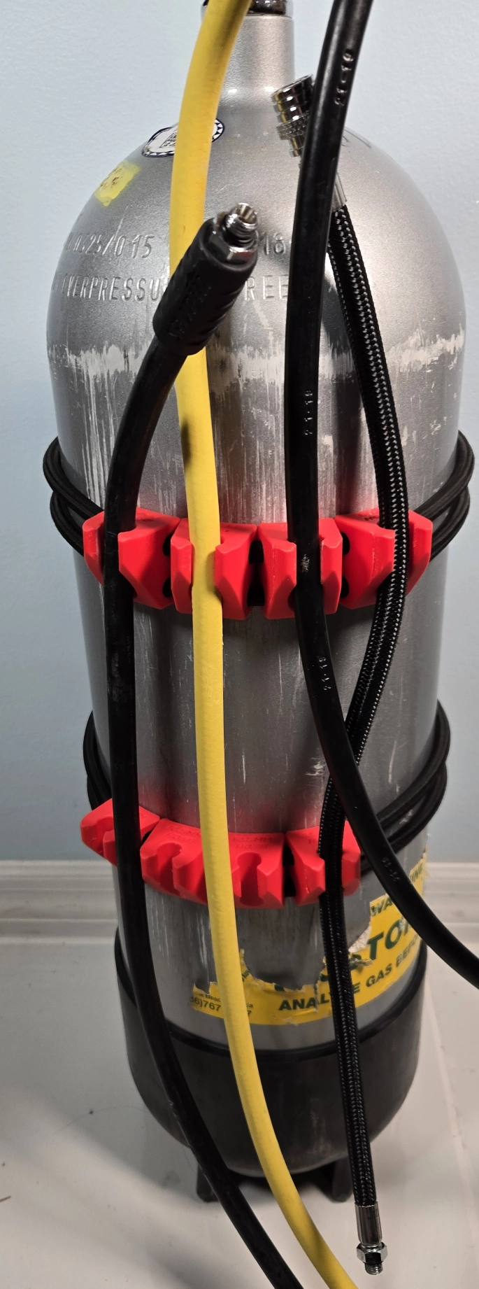 Hose holder with hoses installed
